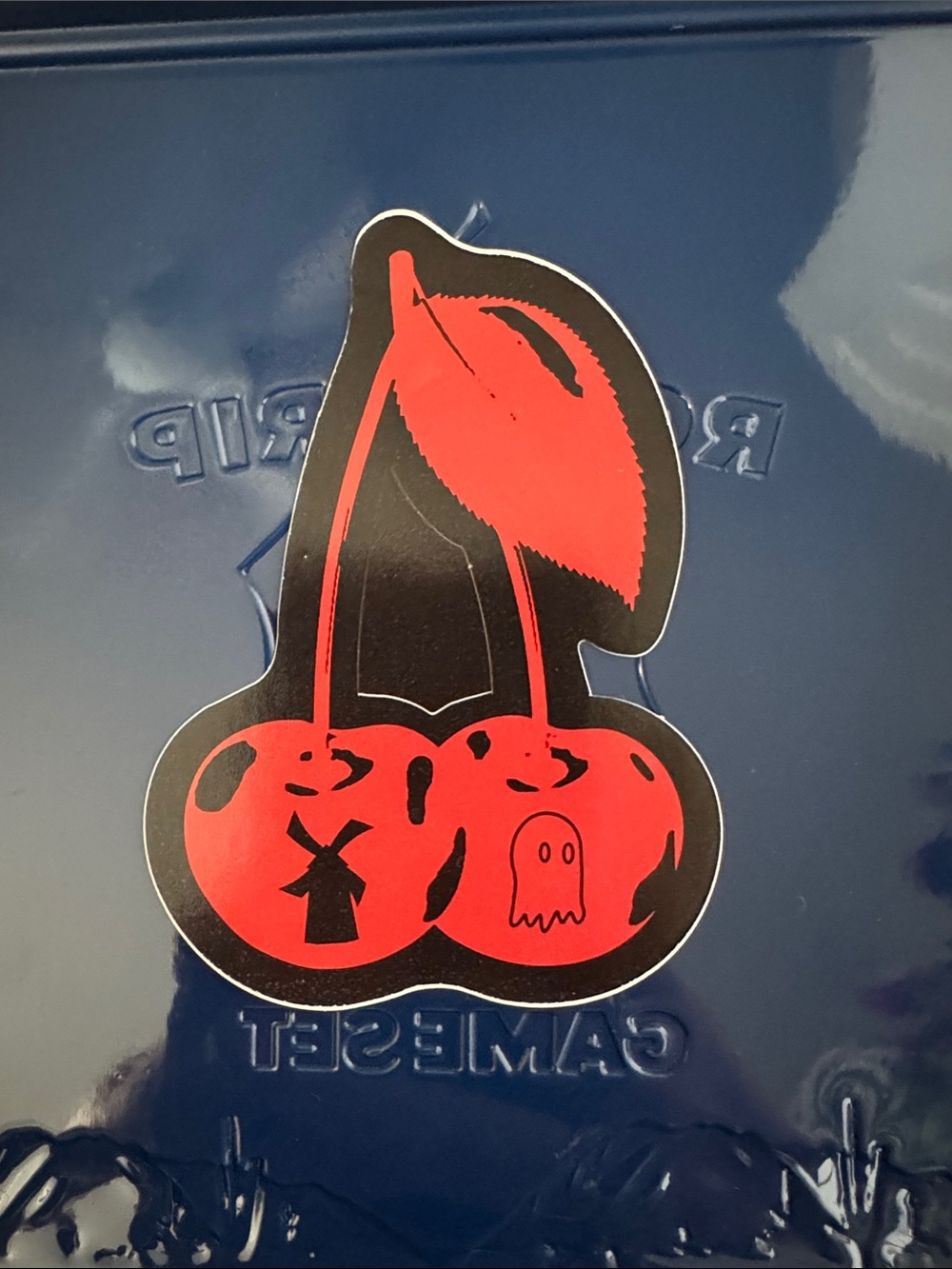 Dutch Bros Red and Black Cherry Sticker with Ghost Icon